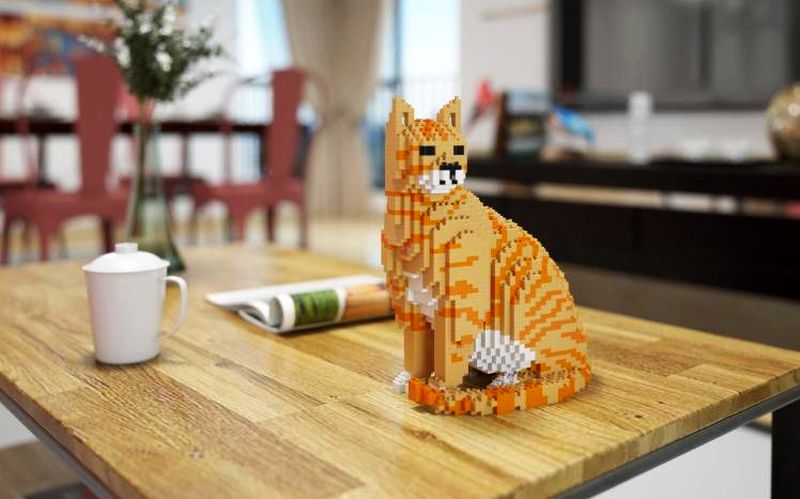 Both kids and adults will go crazy for these Lego cat sculptures