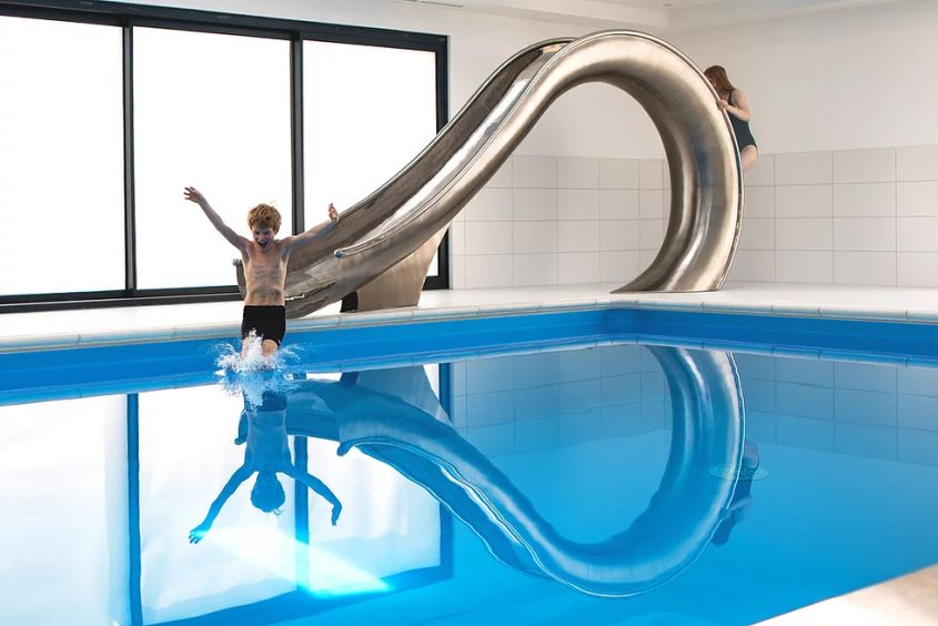 Waha Residential Water Slide from SplinterWorks Fits into Existing Pools
